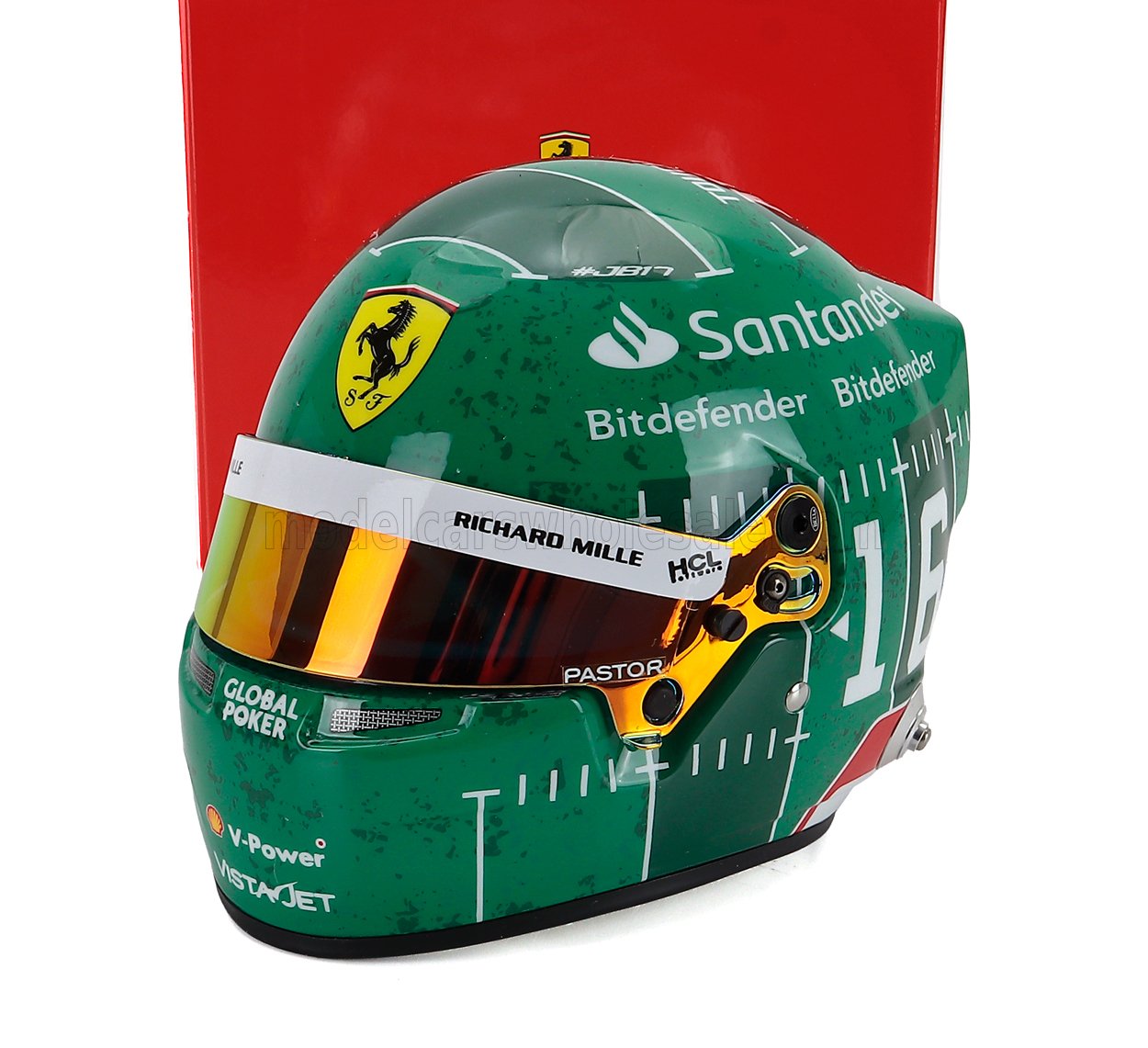 Green Ferrari racing helmet with sponsor logos, displayed as a scale model car collectible at Vroomi