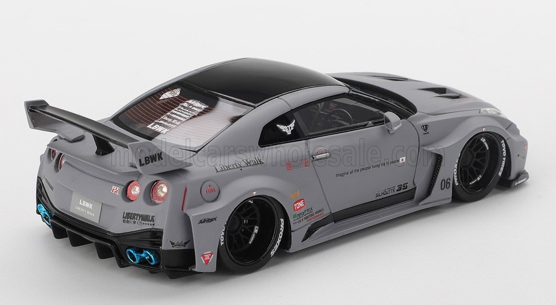 Back view of gray nissan gt35-rr lb-silhouette works gt coupe 2024 diecast with detailed decals and rear spoiler