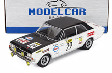 White and black Opel race scale model car with #29, Esso & BIC decals, displayed with Modelcar Group box — Vroomi