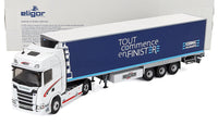 Modellino in scala del semirimorchio Scania bianco con rimorchio blu, esposto con confezione Eligor da Vroomi