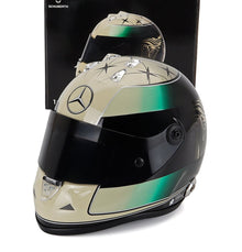 Schuberth racing helmet scale model car accessory by Vroomi, featuring Mercedes logo and green accents