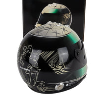Schuberth racing helmet scale model car accessory by Vroomi, black with gold star and wave graphics