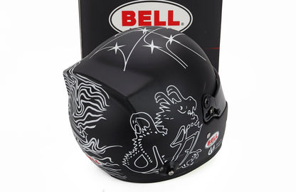 Black Bell racing helmet with white dragon design, displayed with box — scale model car accessory at Vroomi