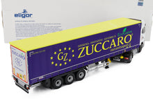Zuccaro EcoGreen Modellauto im Maßstab 1:43 von Eligor, mit violettem Anhänger mit gelben Sternen, präsentiert in der Vroomi-Verpackung.