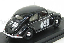 Black vintage race car model with number 026, displayed on a black platform, available on Vroomi
