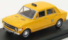 Yellow classic taxi model car on black display base, vintage design, now offered on Vroomi