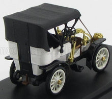 Detailed vintage white and black car model with brass accents, available now on Vroomi platform