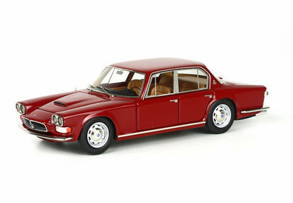 Red classic vintage model car with tan interior, four-door sedan style, offered on Vroomi