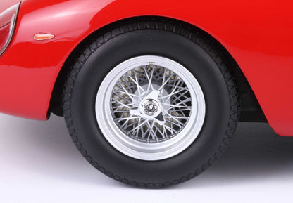 Close-up of a classic red car's chrome wire spoke wheel with tire, featured on Vroomi platform
