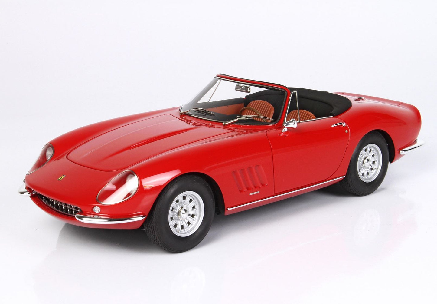 Red vintage convertible sports car model with tan interior, chrome details, showcased with Vroomi access