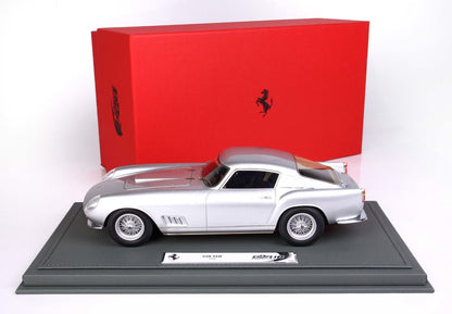 Silver 1958 Ferrari 250 TDF model car on gray base with red Ferrari box, available on Vroomi