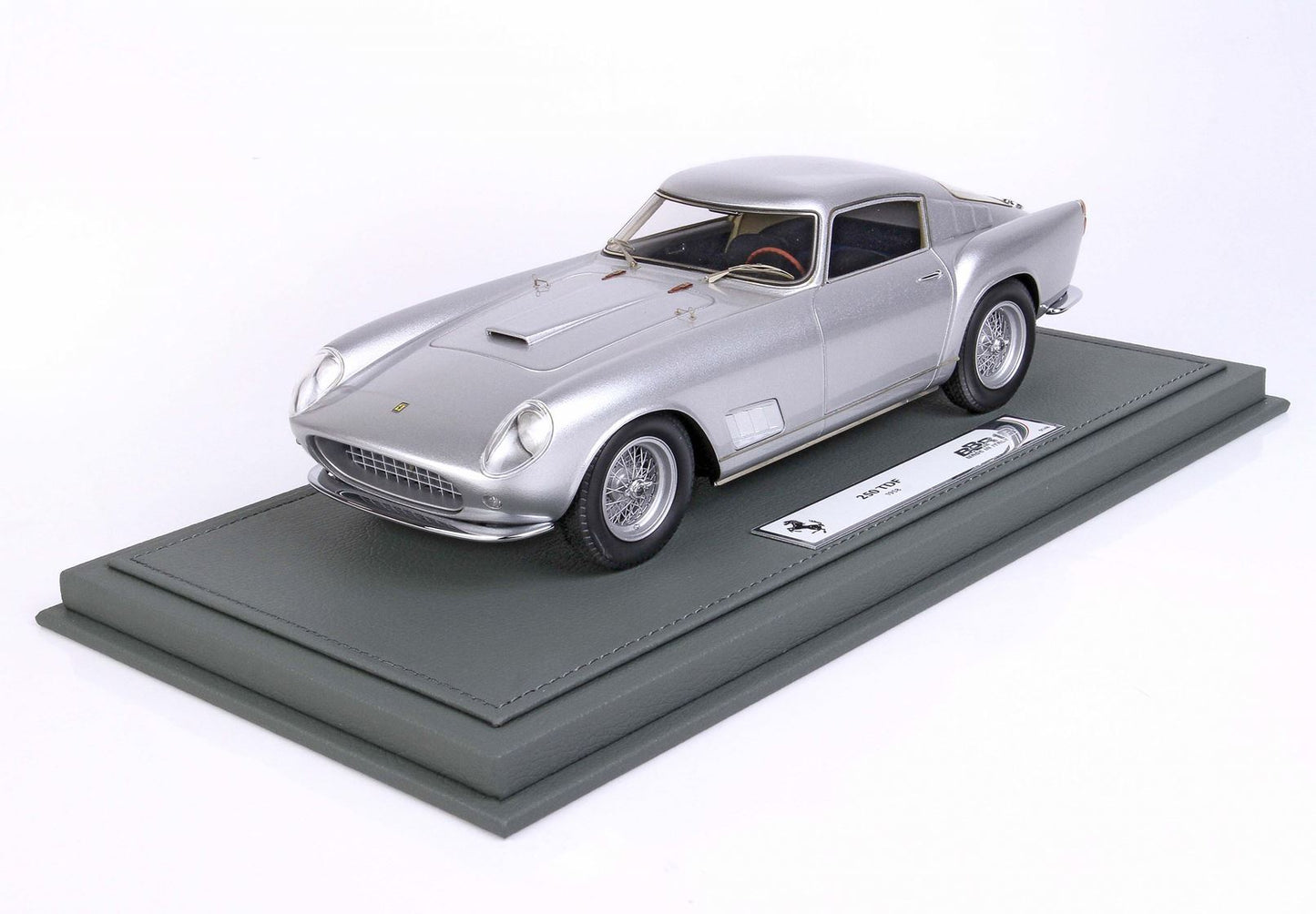Silver 1958 Ferrari 250 TDF model car on gray display base, available through Vroomi