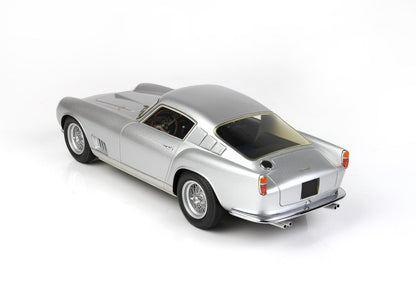 Silver vintage sports car model with wire wheels, detailed interior, available on Vroomi platform