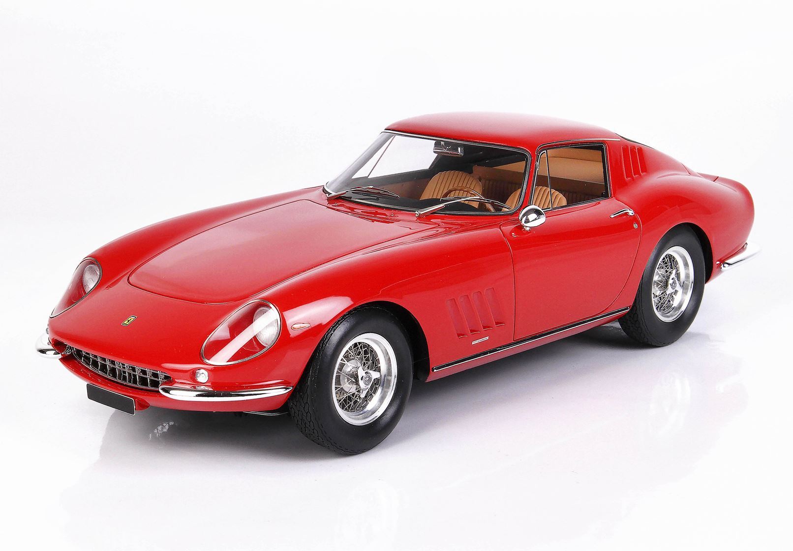 Red classic Ferrari 275 GTB model car with beige interior on white background, now offered on Vroomi