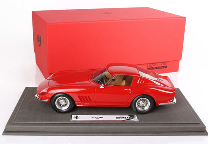 Red 1966 Ferrari 275 GTB2 1:18 scale model on display base with red box, available on Vroomi