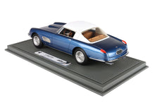 Blue and white classic Ferrari model car on display base, collectible now available via Vroomi