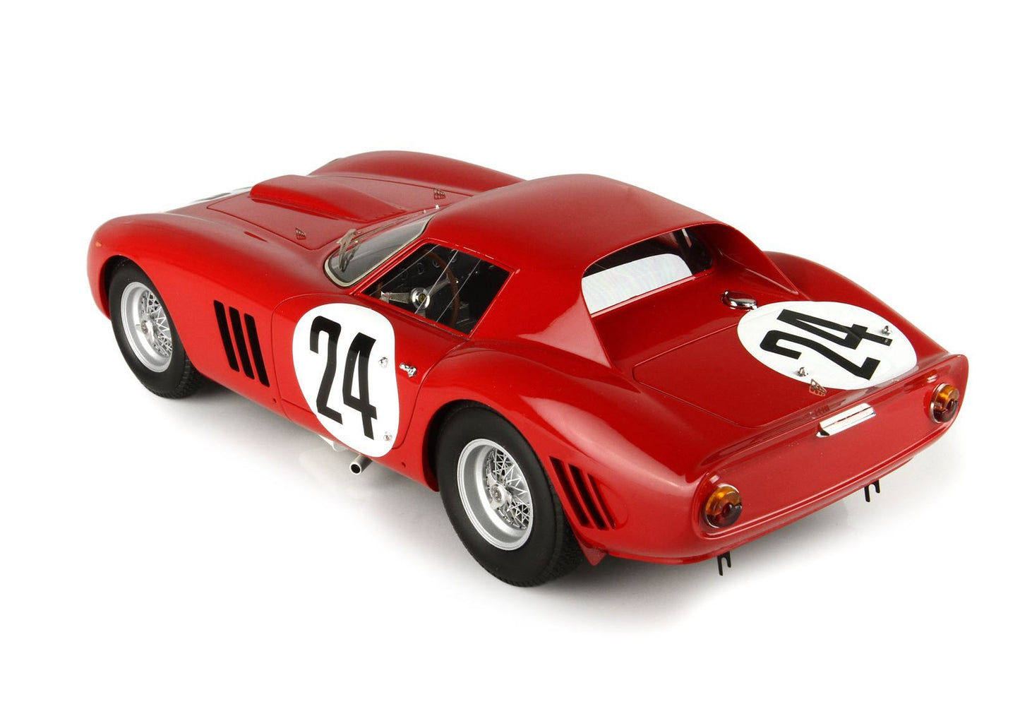 Red vintage race car with number 24, sleek design and wire-spoke wheels, offered on Vroomi