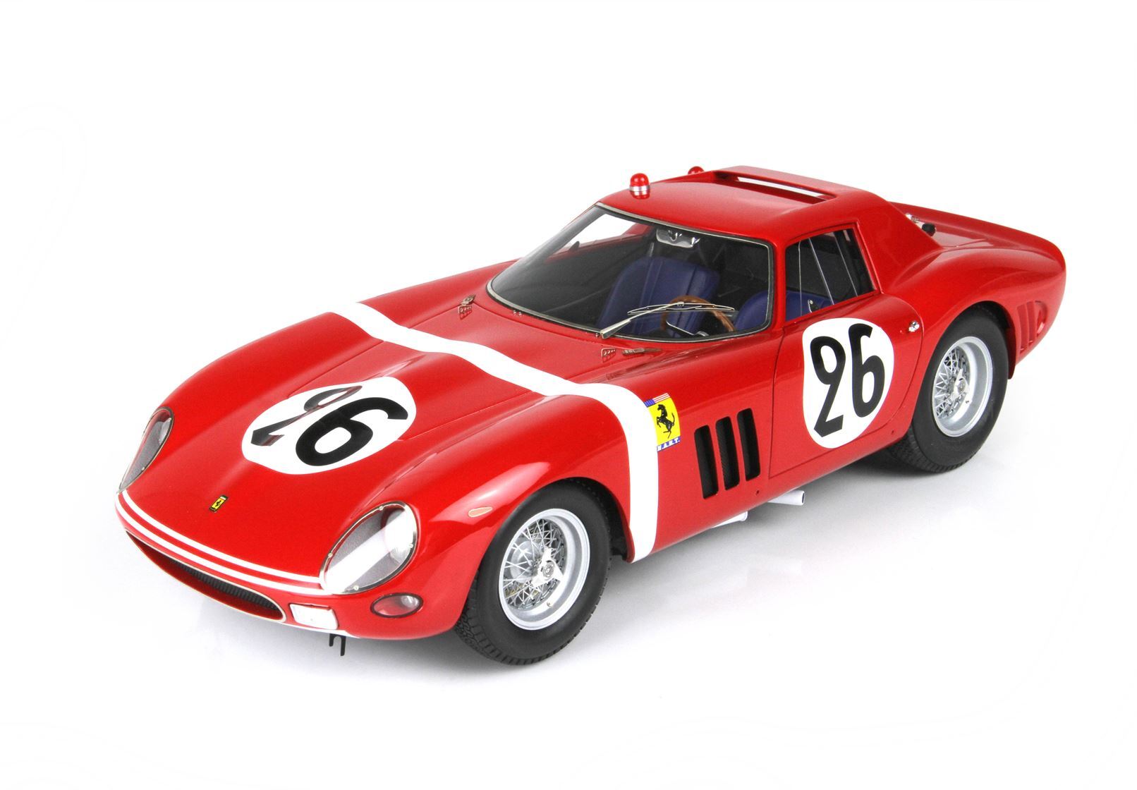 Red vintage Ferrari race car model with white racing stripes and number 26, available on Vroomi