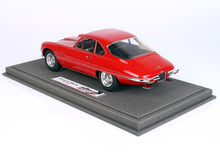 Red Ferrari 400 Superfast model car displayed on grey base available via Vroomi platform