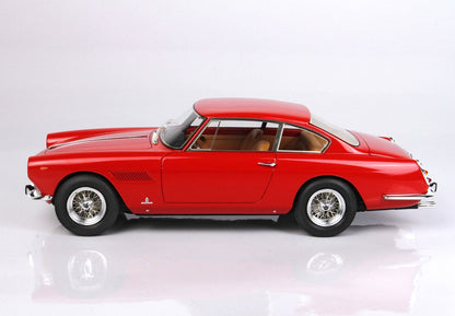 Classic red vintage coupe car with tan interior on white background, available through Vroomi