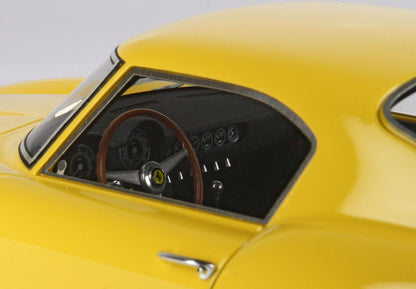 Close-up of yellow classic car interior with wooden steering wheel, available on Vroomi