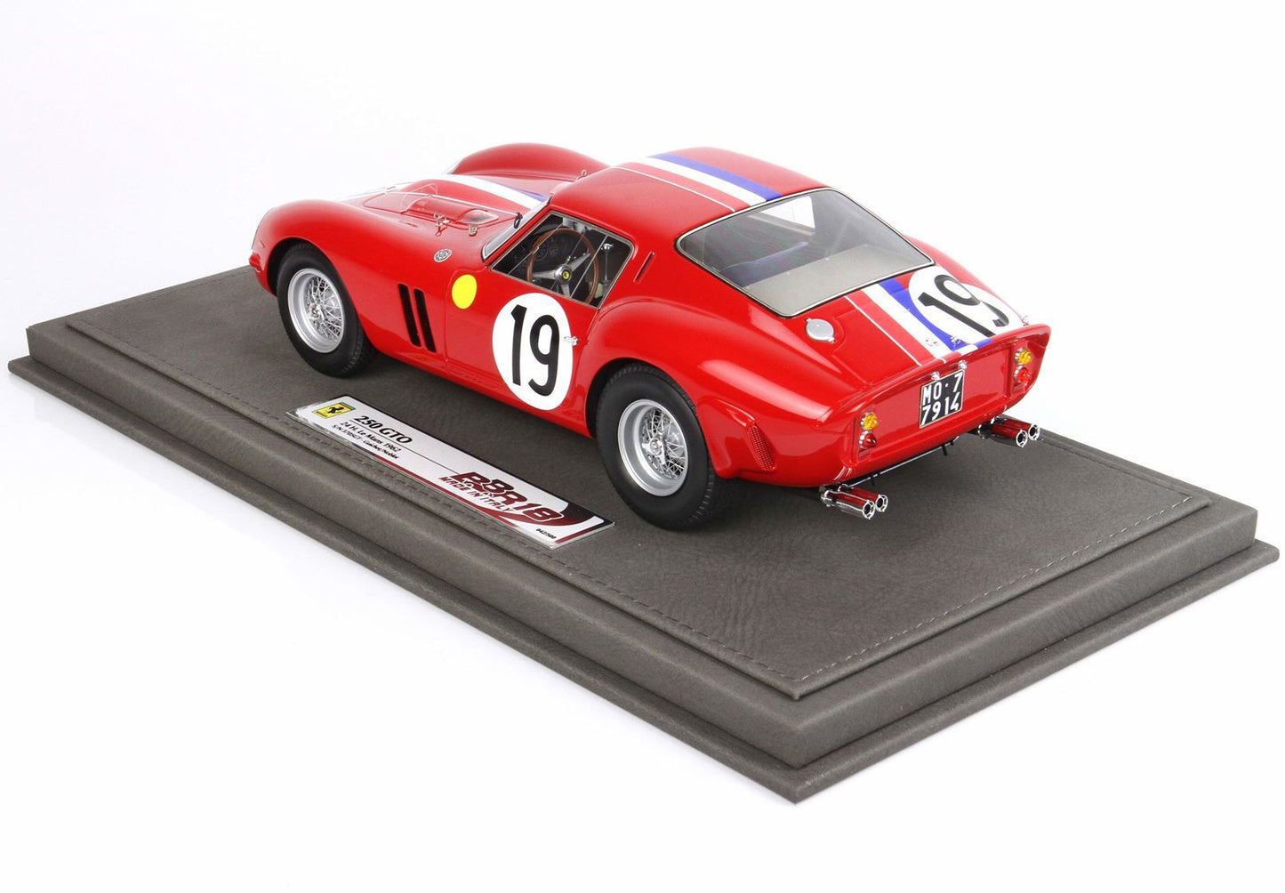 Red Ferrari 250 GTO model car with racing number 19 displayed on a gray base, available on Vroomi