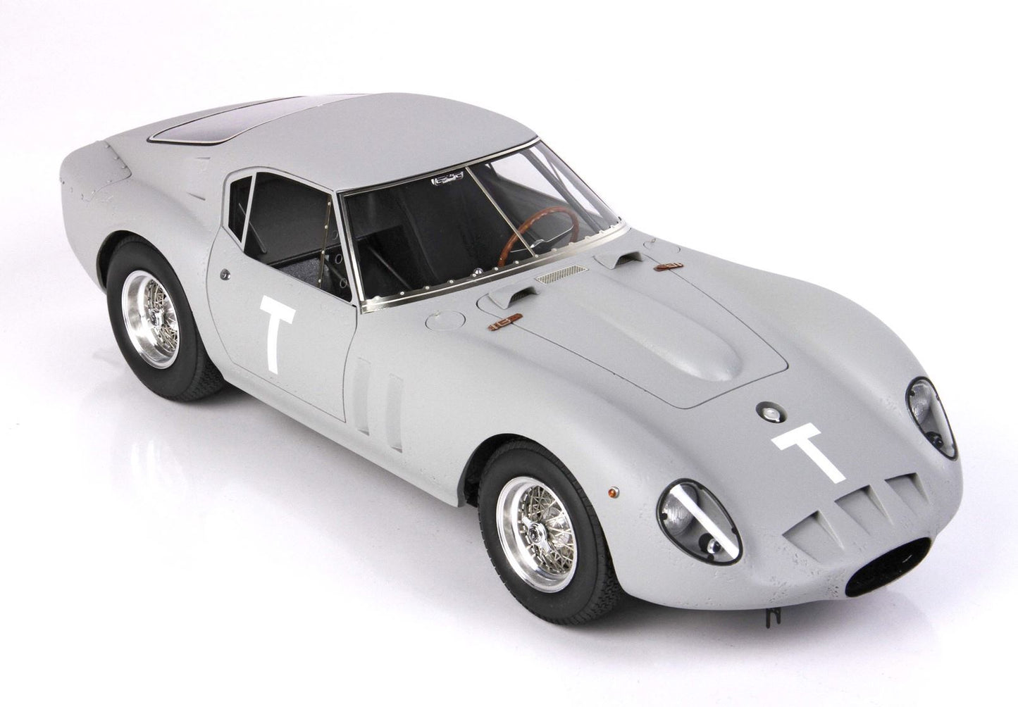 Gray classic racing car model with wire wheels and white T markings, offered on Vroomi