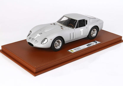 Silver Ferrari 250 GTO model on a brown leather base, available through Vroomi platform