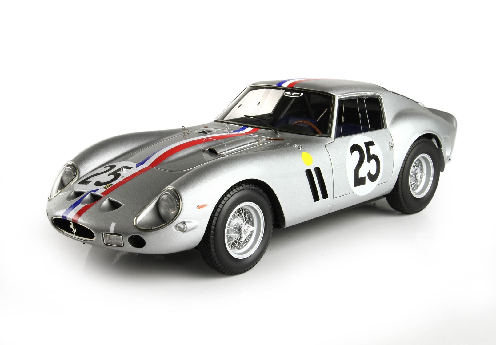 Silver vintage race car with number 25 and red-white-blue stripe, available via Vroomi