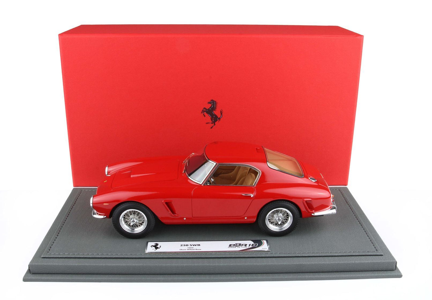 Red Ferrari 250 SWB model car on gray base with red Ferrari backdrop, available on Vroomi