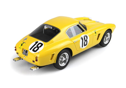 Yellow vintage Ferrari race car model with number 18, chrome wheels, and dual exhaust, offered on Vroomi