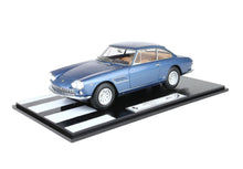 Blue classic Ferrari 330 GTC 1:18 scale model on black striped display, available via Vroomi