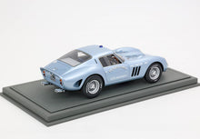 Light blue vintage Ferrari 250 GTO model car on display base, labeled Victoria High, available on Vroomi