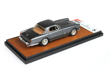 Scale model of 1960 Ferrari 250 GT Pininfarina Coupe in dark gray, displayed on a leather-textured base, available on Vroomi platform