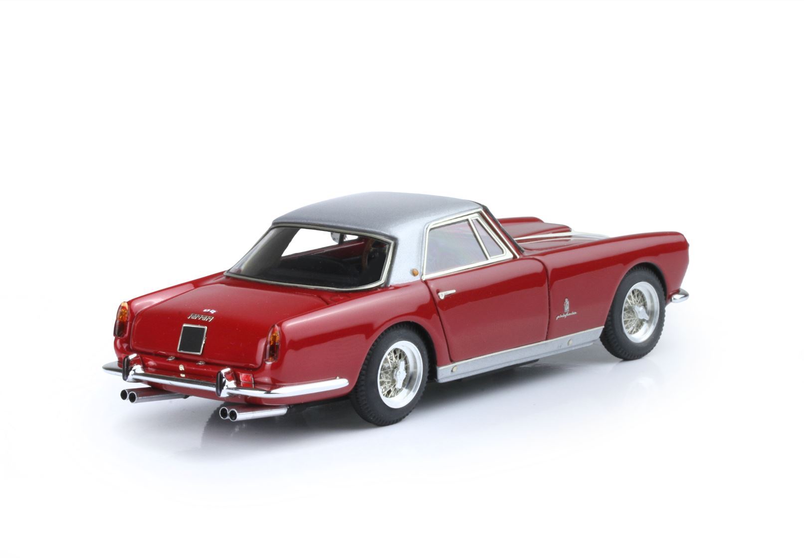 Red vintage Ferrari model car with silver roof and wire-spoke wheels, available via Vroomi platform