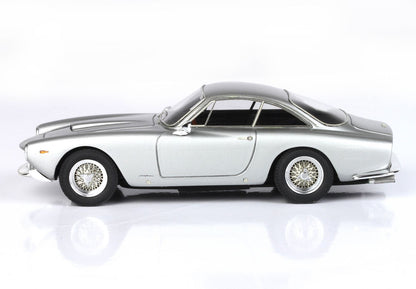 Silver vintage coupe car model with wire spoke wheels, shown from side, available on Vroomi