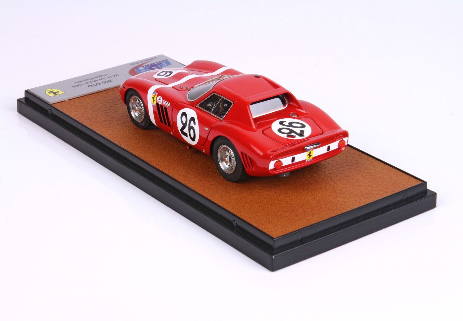 Red Ferrari 250 GTO 1962 model car with number 26 on display base, available on Vroomi