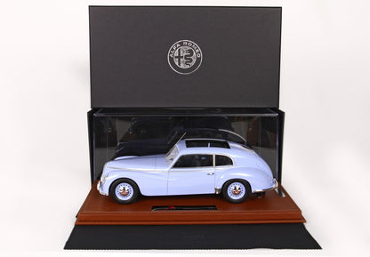 Light blue Alfa Romeo vintage car model in display box on leather base, available on Vroomi