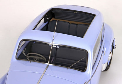 Light blue vintage car with black interior and sunroof, available through Vroomi platform