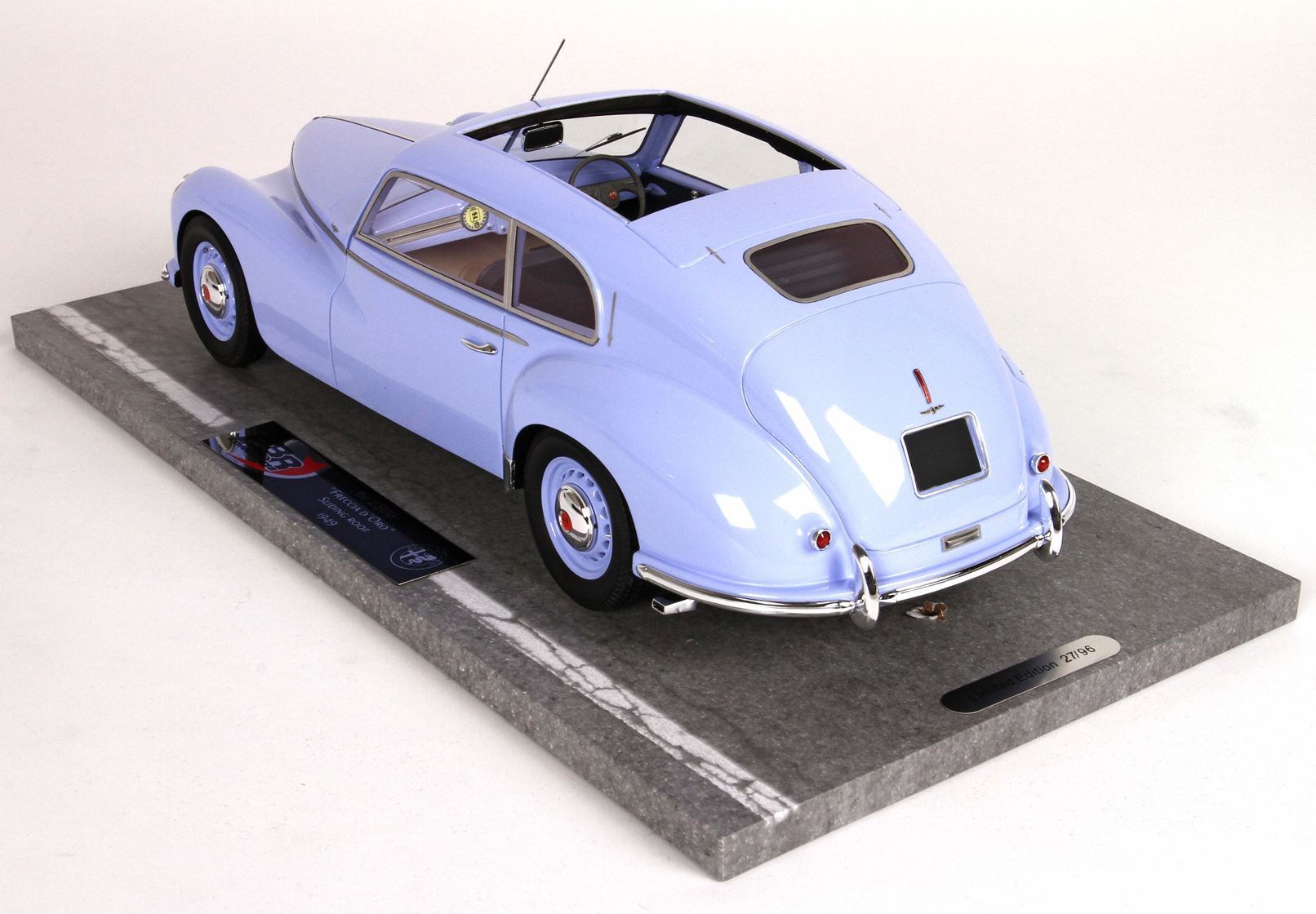 Light blue classic Alfa Romeo 1949 model car on display base, available to order via Vroomi