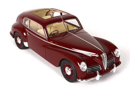Vintage maroon classic car model with beige interior and sunroof, offered on Vroomi