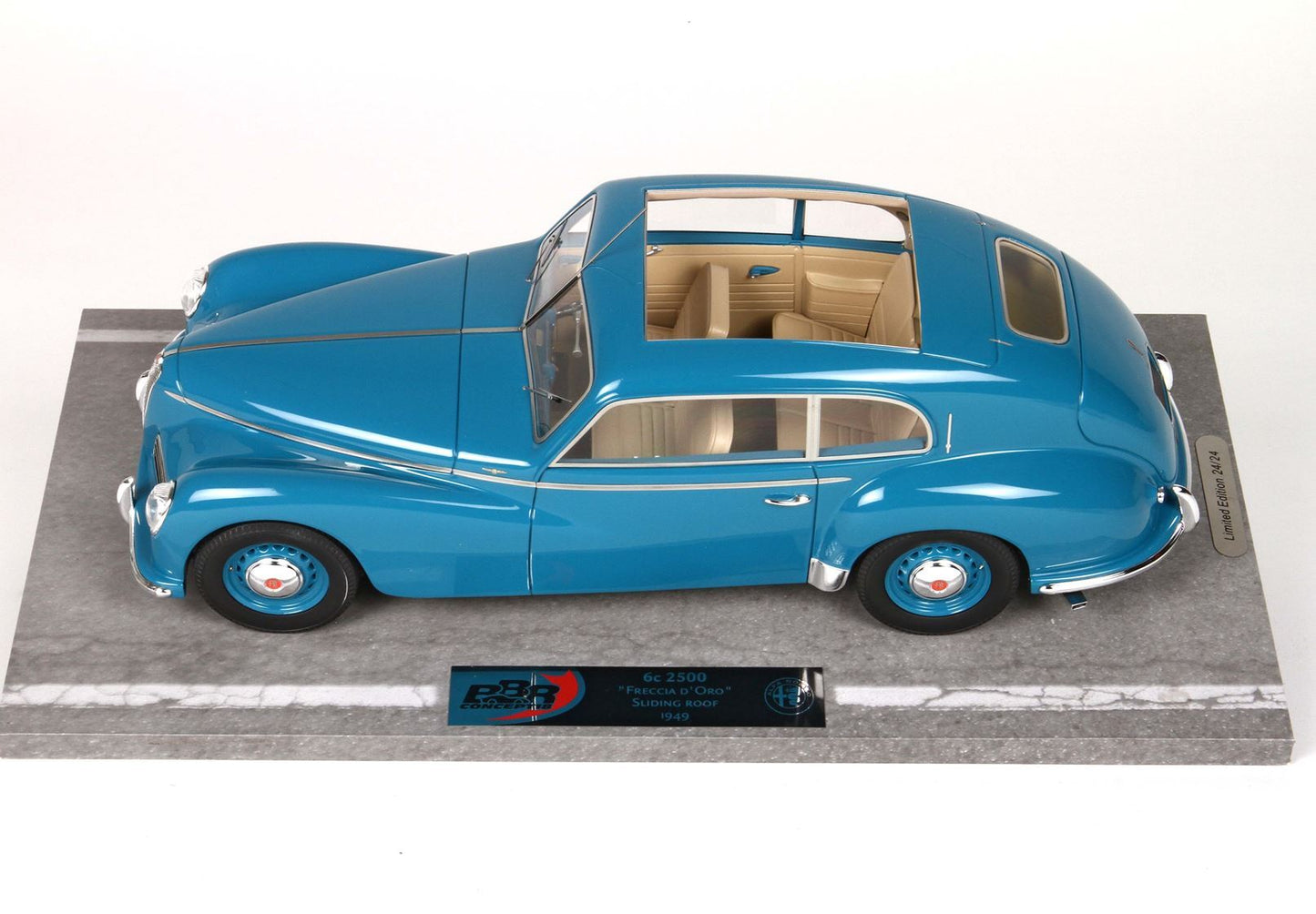 Blue 1949 Alfa Romeo 6c 2500 'Freccia d'Oro' model car with sliding roof, beige interior, available via Vroomi.