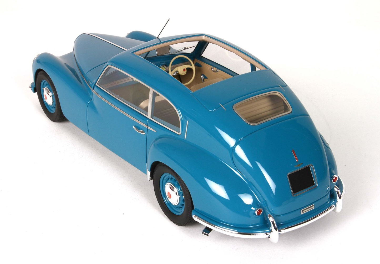Blue classic vintage car model with tan interior and chrome details available on Vroomi-inspired platform