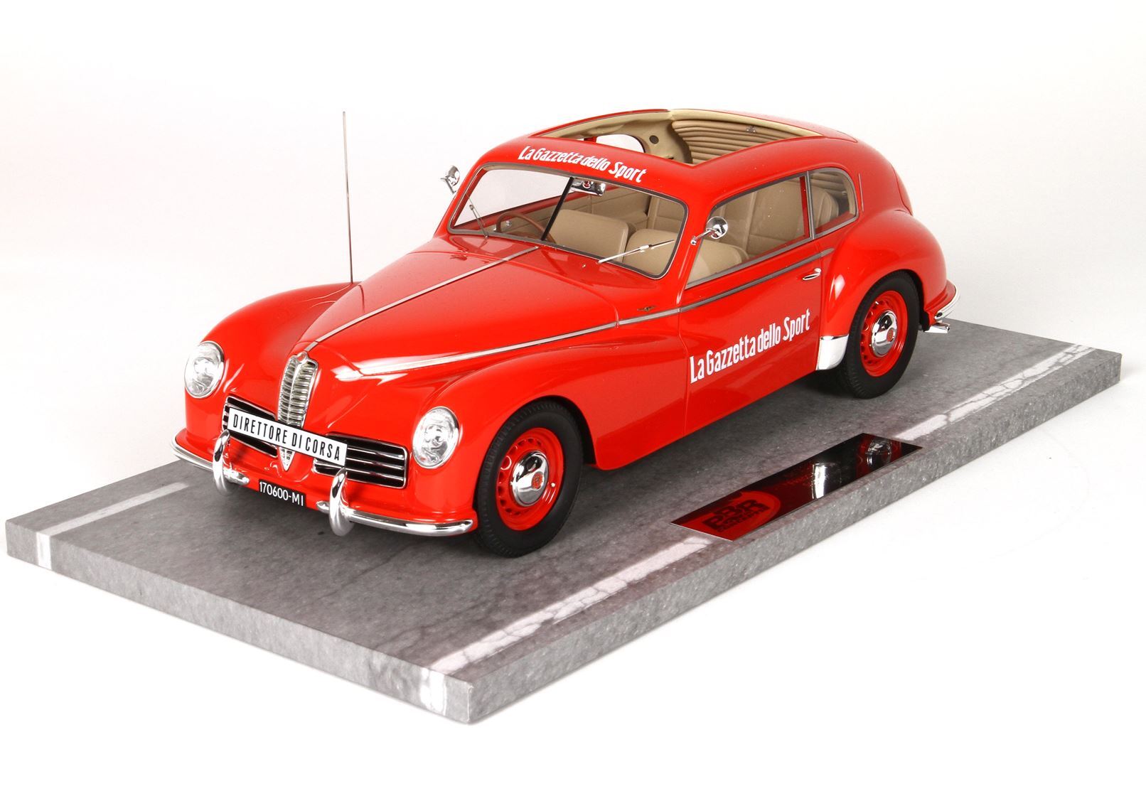 Red vintage La Gazzetta dello Sport model car on display base, available through Vroomi