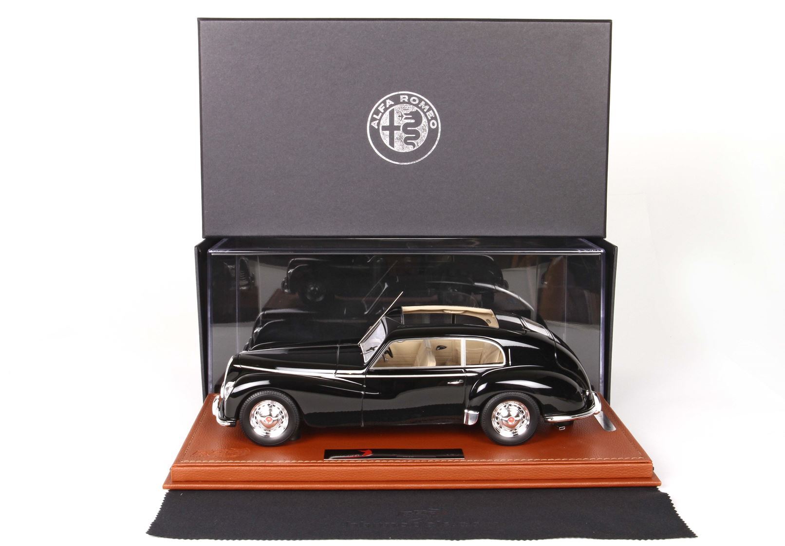 Black Alfa Romeo classic car scale model with cream interior in display case, offered on Vroomi