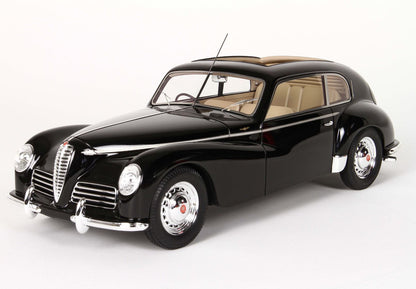 Black vintage Alfa Romeo model car with chrome grille and beige interior, now offered on Vroomi