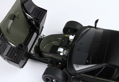 Black sports car front trunk open showing detailed interior with tire and components, available on Vroomi
