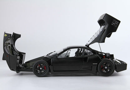 Black Ferrari F40 sports car model with open front and rear hoods showcasing detailed interior and engine, offered on Vroomi