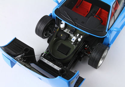 Detailed close-up of blue sports car front trunk showing tires and red interior, offered on Vroomi