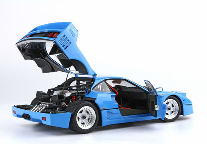 Blue classic sports car model with open rear engine hood and driver door, available on Vroomi